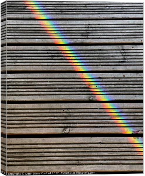 Prisms of light travelling over the decking. Canvas Print by DEE- Diana Cosford