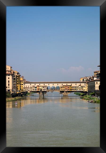 Ponte Vecchio over the river Arno in Florence Framed Print by Phil Crean