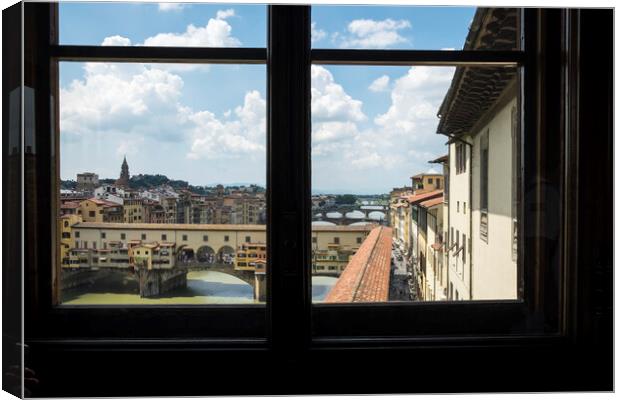 Ponte Vecchio over the river Arno in Florence Canvas Print by Phil Crean