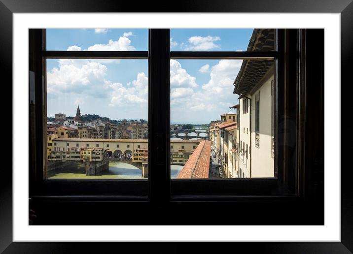 Ponte Vecchio over the river Arno in Florence Framed Mounted Print by Phil Crean