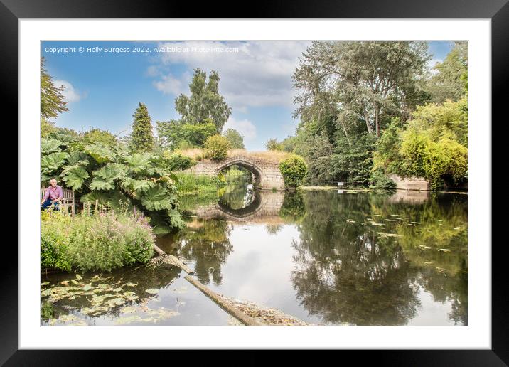 Grounds of Warkworth Castle on the river with a arch and flowing water  Framed Mounted Print by Holly Burgess