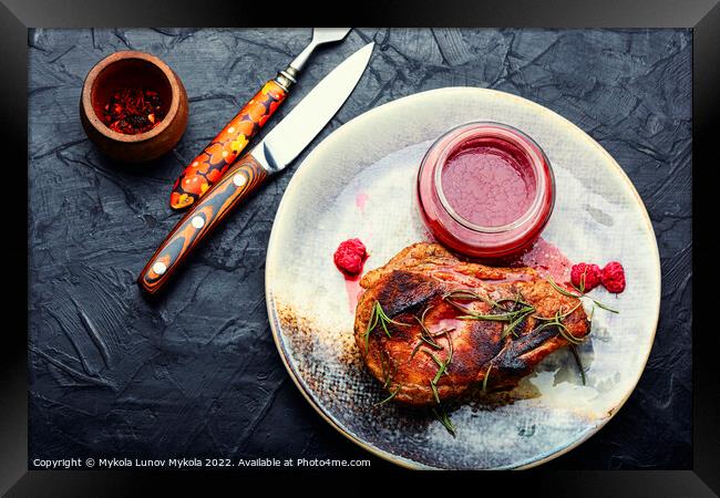 Fried steak with raspberry sauce Framed Print by Mykola Lunov Mykola