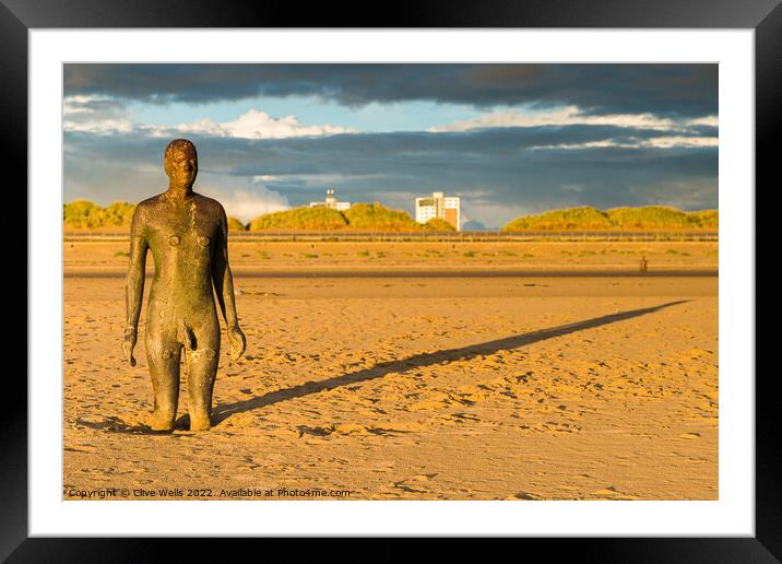 Golden hour and the Iron Man Framed Mounted Print by Clive Wells