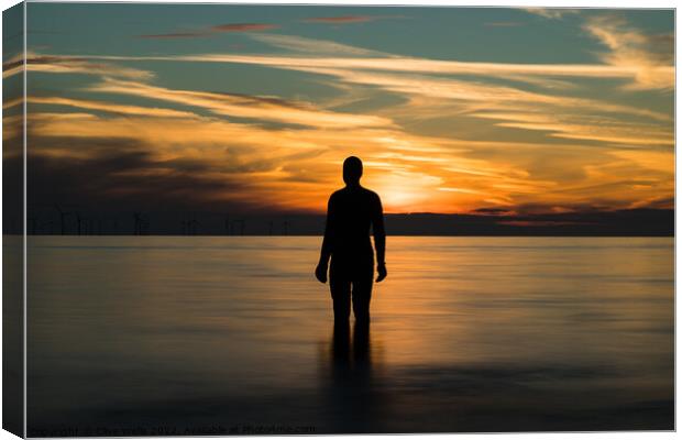 Sunset with an Iron Man Canvas Print by Clive Wells