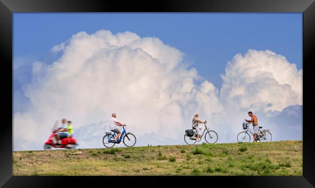 Cyclists and Thunderstorm Framed Print by Arterra 