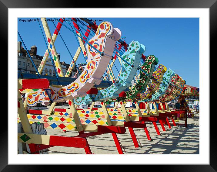 Swinging Boats Framed Mounted Print by Nicola Clark