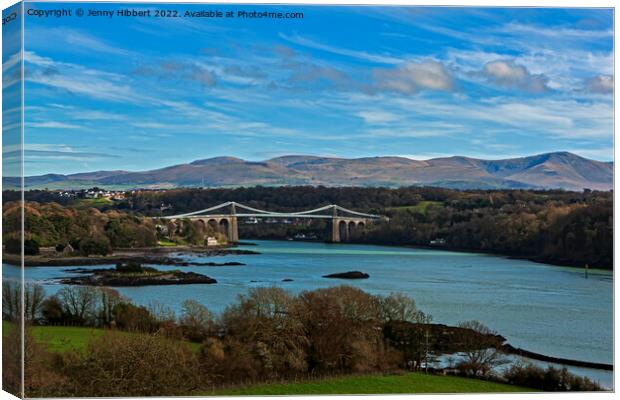 Menai Bridge spanning over the Menai Strait Isle of Anglesey North Wales Canvas Print by Jenny Hibbert
