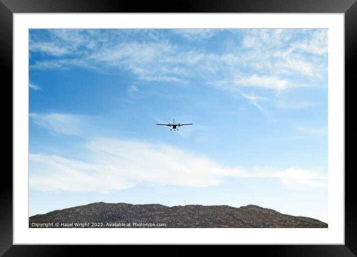 Plane landing, Barra airport Framed Mounted Print by Hazel Wright