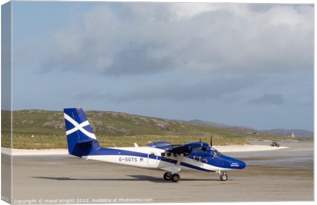 Plane at Barra airport Canvas Print by Hazel Wright