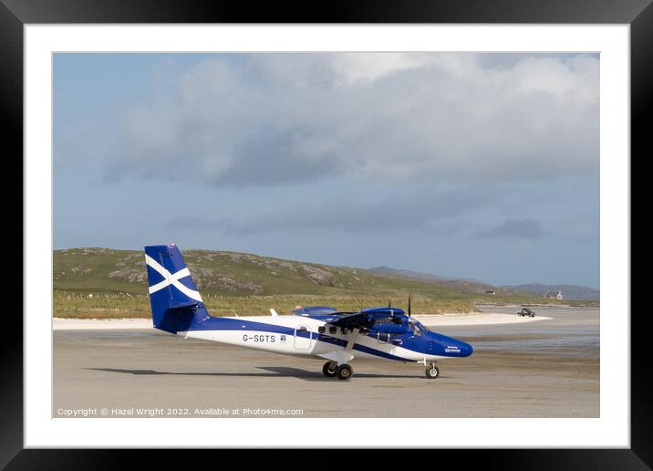 Plane at Barra airport Framed Mounted Print by Hazel Wright