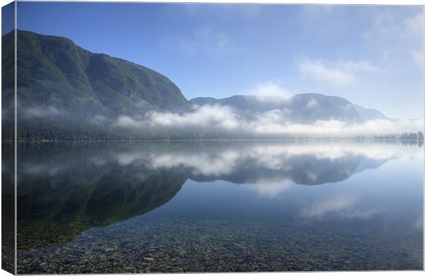 Morning reflections Canvas Print by Ian Middleton