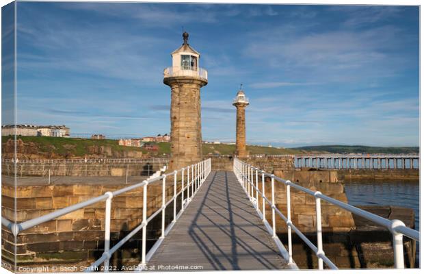 Whitby Harbour Lighthouses Canvas Print by Sarah Smith