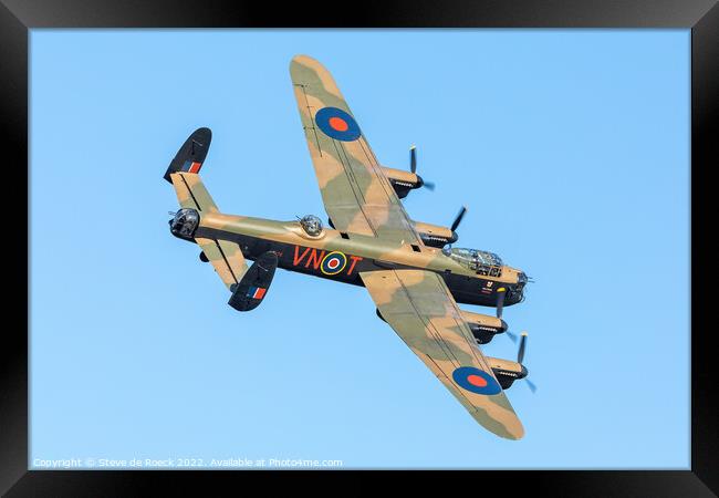 Avro Lancaster of BBMF banks round for a landing. Framed Print by Steve de Roeck