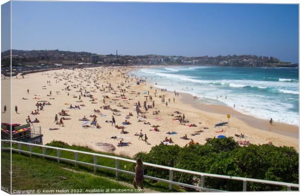 Bondi beach on a sunny summers day Canvas Print by Kevin Hellon