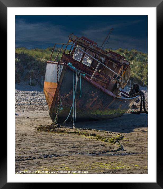Boat on a beach Framed Mounted Print by Alan Dunnett