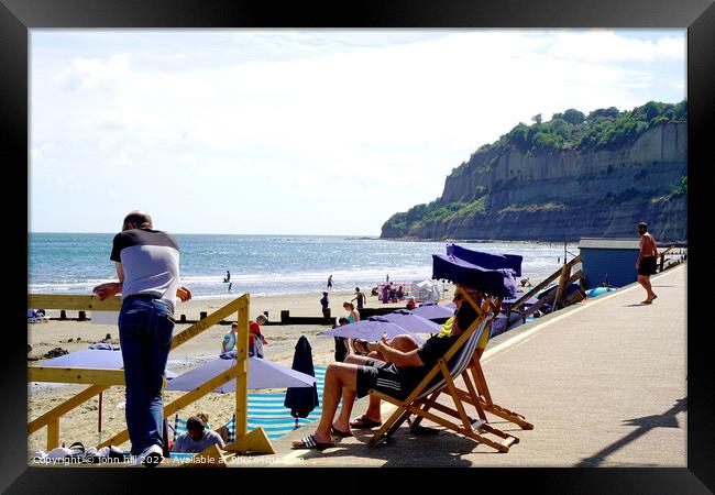 Relaxation, Clock tower beach Shanklin, Isle of Wight. Framed Print by john hill