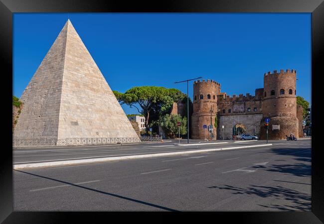 Pyramid of Cestius and San Paolo Gate in Rome Framed Print by Artur Bogacki