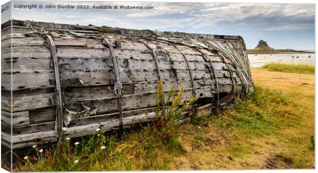 Lindisfarne Boat Shed Canvas Print by John Dunbar