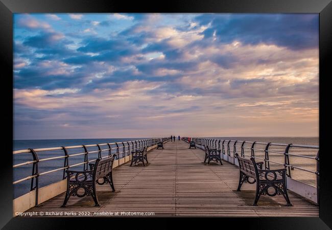 Clouds gather over Saltburn Pier Framed Print by Richard Perks