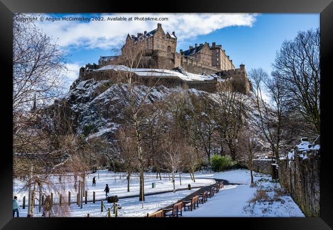 Edinburgh Castle from Princes Street Gardens snow Framed Print by Angus McComiskey