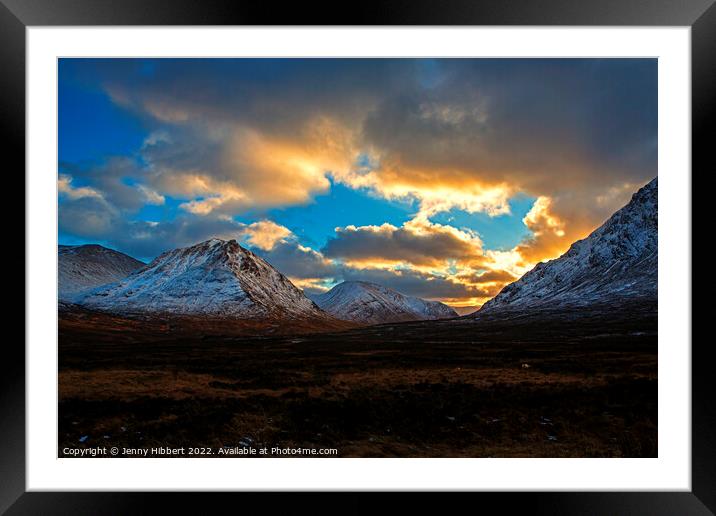 Sunsetting over the mountains in Glencoe Highlands of Scotland Framed Mounted Print by Jenny Hibbert