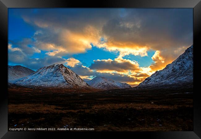 Sunsetting over the mountains in Glencoe Highlands of Scotland Framed Print by Jenny Hibbert