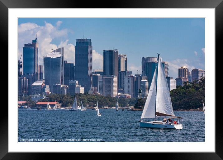 Yachts sailing in Sydney harbour witheCentral Business District, Framed Mounted Print by Kevin Hellon