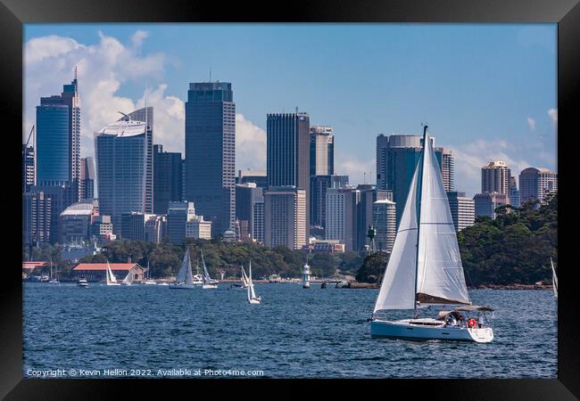 Yachts sailing in Sydney harbour witheCentral Business District, Framed Print by Kevin Hellon