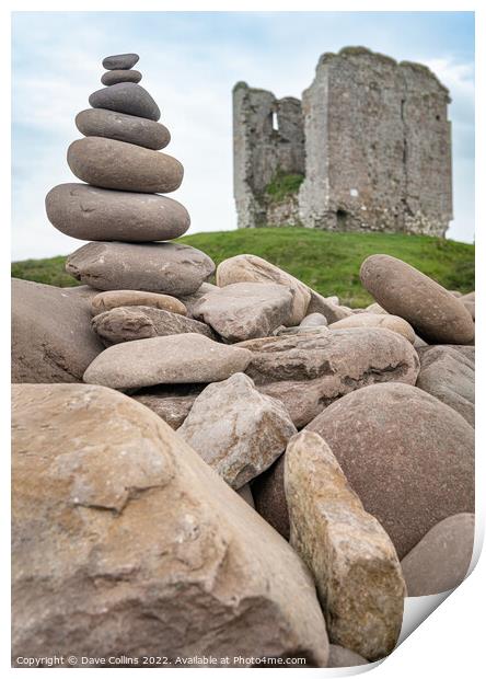 A small rocky cairn on the rocky sea wall at Minard Beach with the remains of Minard Castle defocused in the back, County Kerry, Ireland Print by Dave Collins