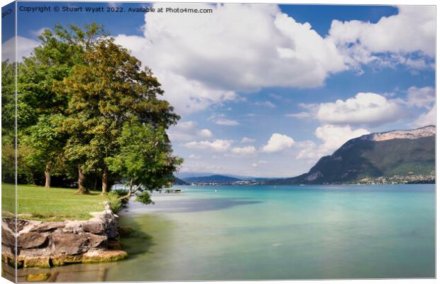 The emerald water of Lake Annecy Canvas Print by Stuart Wyatt