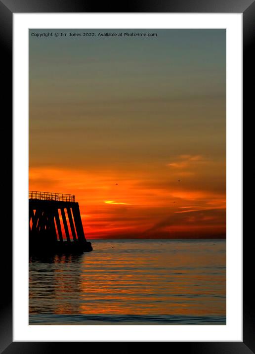 Sunrise, seagulls and silhouettes Framed Mounted Print by Jim Jones