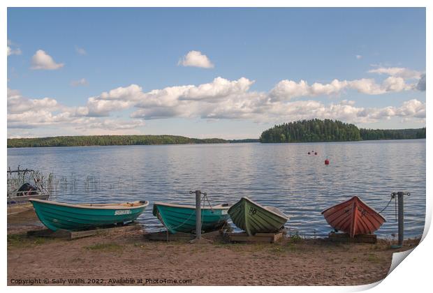 Boats at lakeside, Finland Print by Sally Wallis