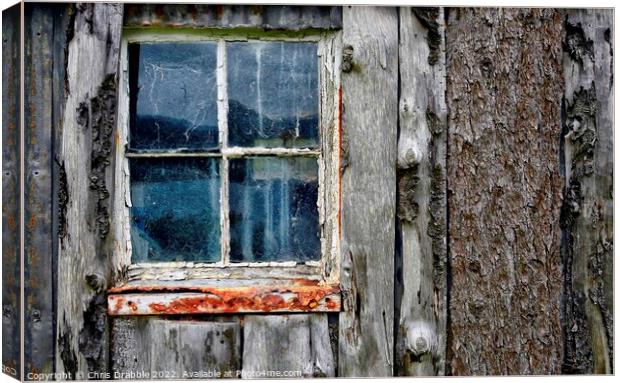 Window and timber Canvas Print by Chris Drabble