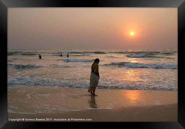 Woman in Sari at Sunset at Benaulim Beach Framed Print by Serena Bowles