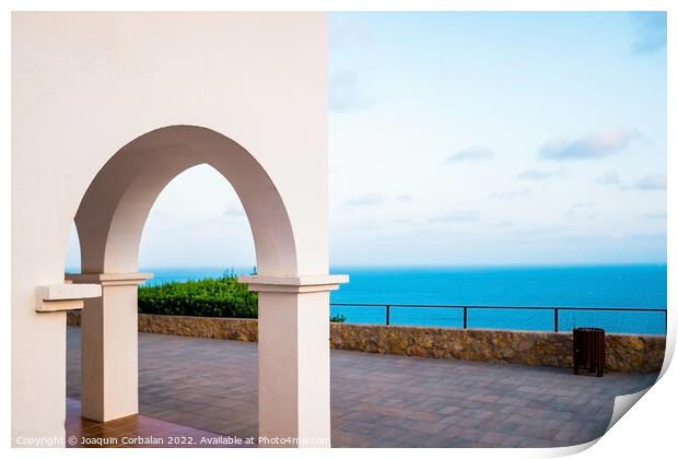 The sea can be seen from the top of a hill, through the traditio Print by Joaquin Corbalan