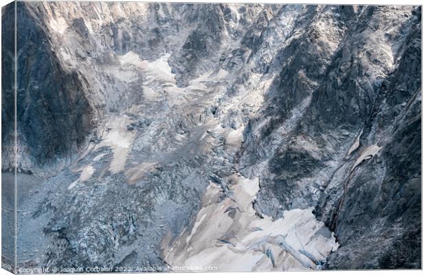 Detail of steep and inaccessible rocky mountains in the alps. Canvas Print by Joaquin Corbalan