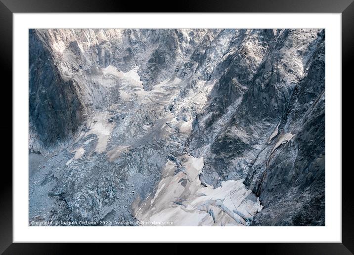 Detail of steep and inaccessible rocky mountains in the alps. Framed Mounted Print by Joaquin Corbalan