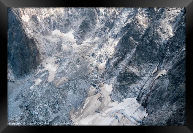 Detail of steep and inaccessible rocky mountains in the alps. Framed Print by Joaquin Corbalan