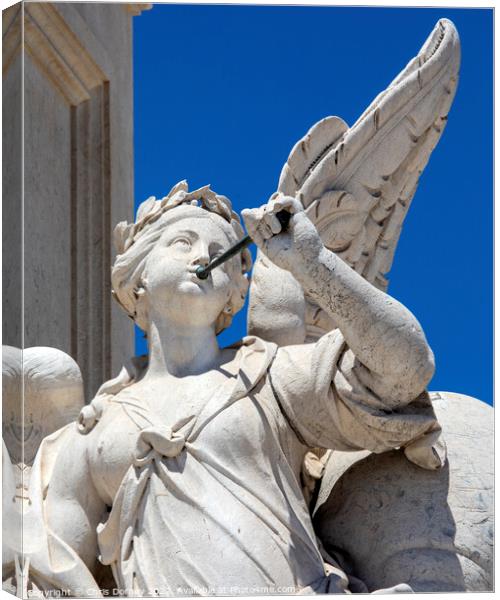 Sculpture at the base of the Joseph I Statue in Lisbon, Portugal Canvas Print by Chris Dorney