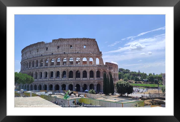 ROME, ITALY - July 7 2022: Colosseum in Rome, Italy. Ancient Roman Colosseum is one of the main tourist attractions in Italy People visit the famous Colosseum in Roma centre. tourism after covid 19 Framed Mounted Print by Anish Punchayil Sukumaran