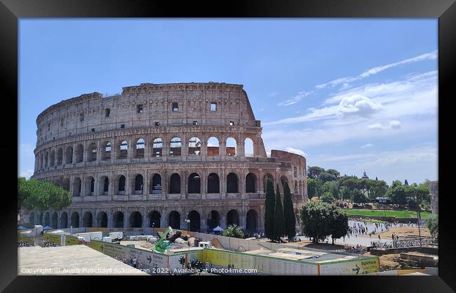 ROME, ITALY - July 7 2022: Colosseum in Rome, Italy. Ancient Roman Colosseum is one of the main tourist attractions in Italy People visit the famous Colosseum in Roma centre. tourism after covid 19 Framed Print by Anish Punchayil Sukumaran