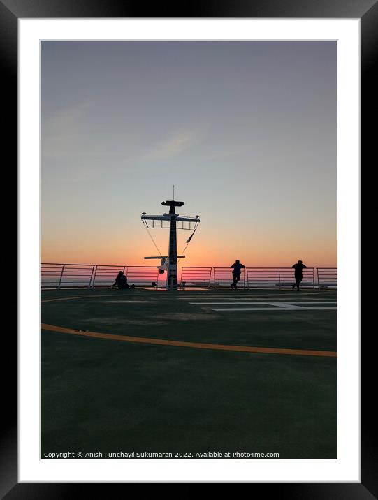 people enjoying sunset on the a helipad of a cruise ship Framed Mounted Print by Anish Punchayil Sukumaran