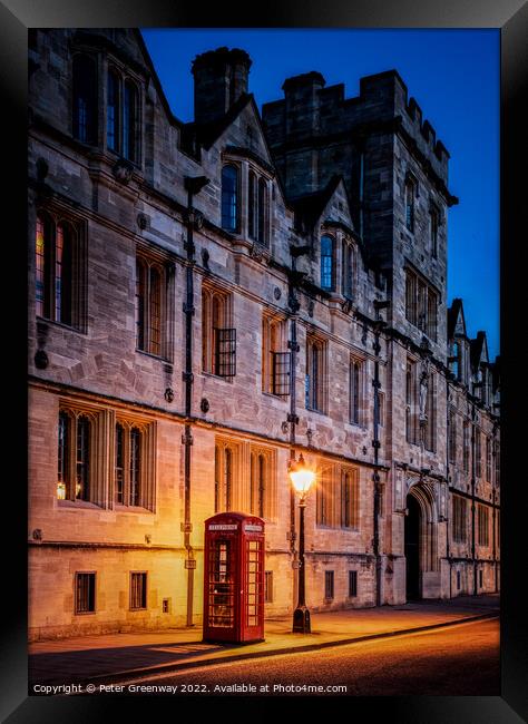 Illuminated Iconic Red British Telephone Box In Oxford City Centre Framed Print by Peter Greenway