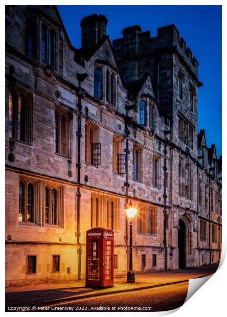 Illuminated Iconic Red British Telephone Box In Oxford City Centre Print by Peter Greenway