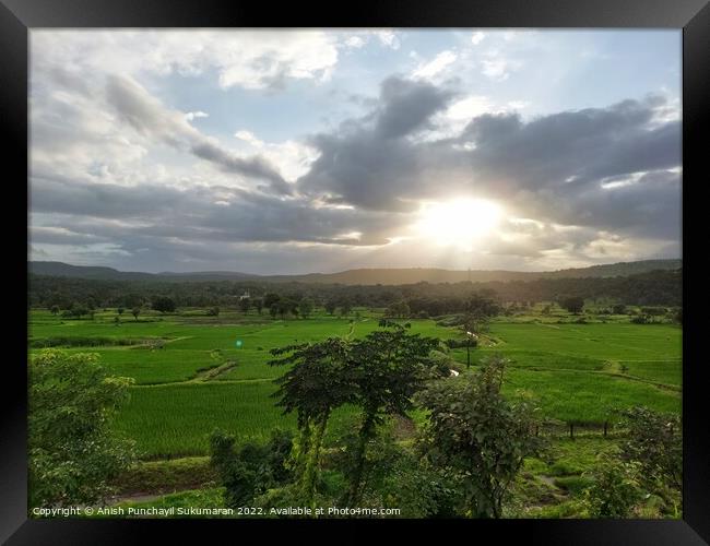 beautiful river near mountain under cloudy sky and a rice field Framed Print by Anish Punchayil Sukumaran