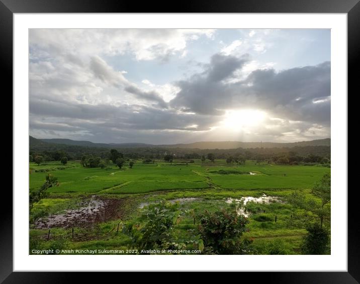 beautiful river near mountain under cloudy sky and a rice field Framed Mounted Print by Anish Punchayil Sukumaran
