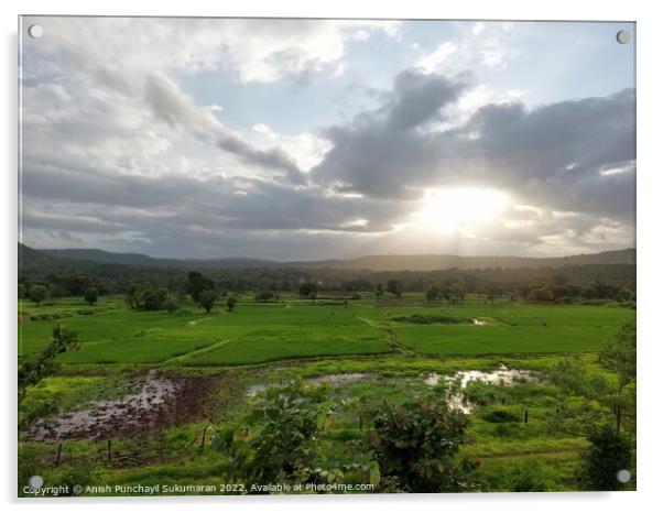beautiful river near mountain under cloudy sky and a rice field Acrylic by Anish Punchayil Sukumaran