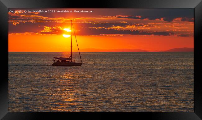 Boat at Sunset on the Adriatic Sea. Framed Print by Ian Middleton