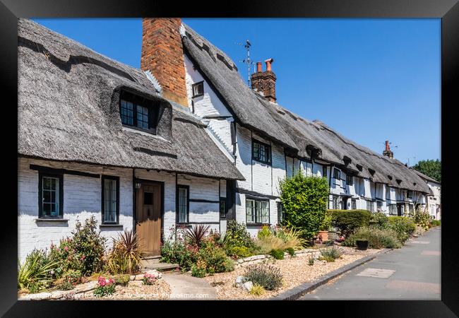 Traditional English thatched cottages  Framed Print by Kevin Hellon