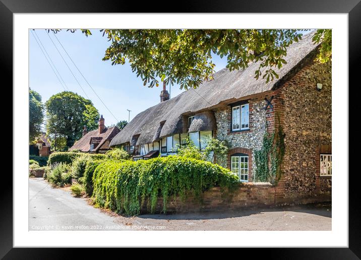 Traditional English thatched cottages  Framed Mounted Print by Kevin Hellon